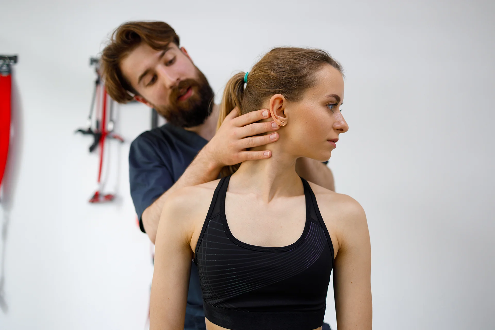 woman receiving neck massage from bearded man